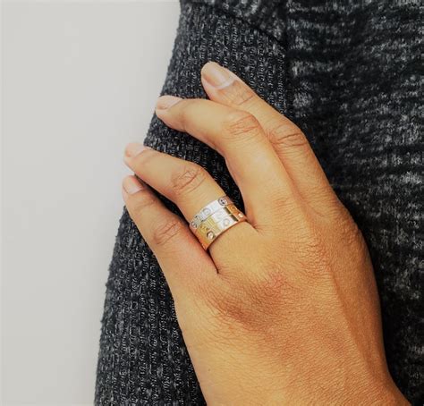 cartier love ring stacked with diamond band|cartier love ring on finger.